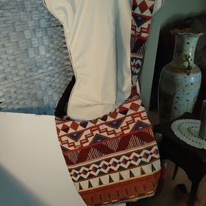 Hobo style Cross body Sling Handbag Rust Cream with black linning